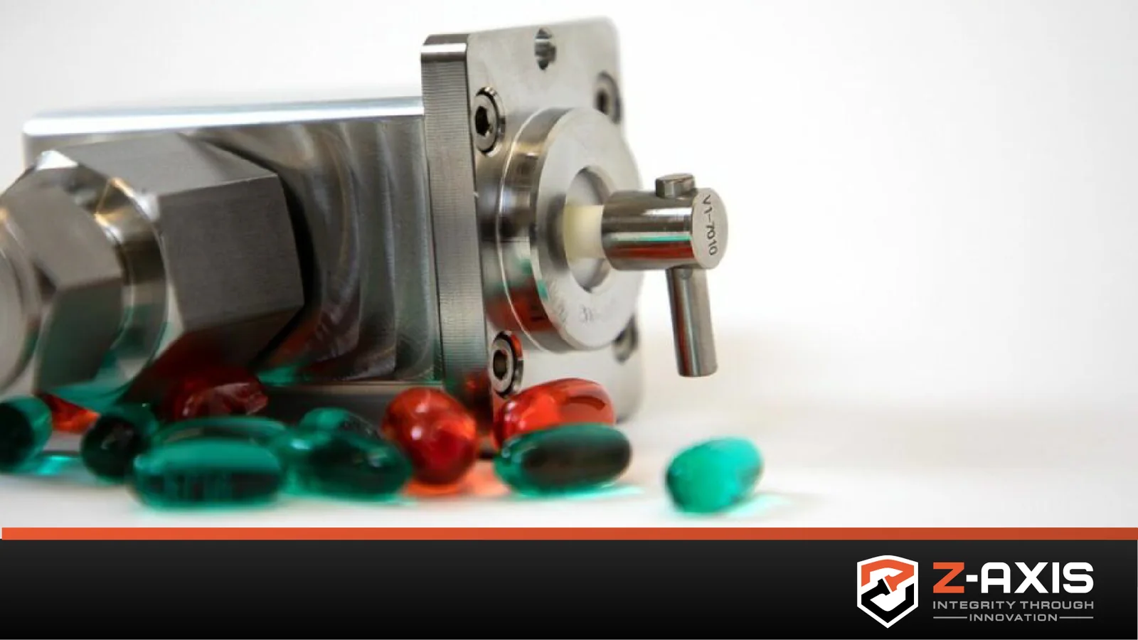 Zaxis V Series Milliliter Pump sitting behind red and green pharmaceutical capsules